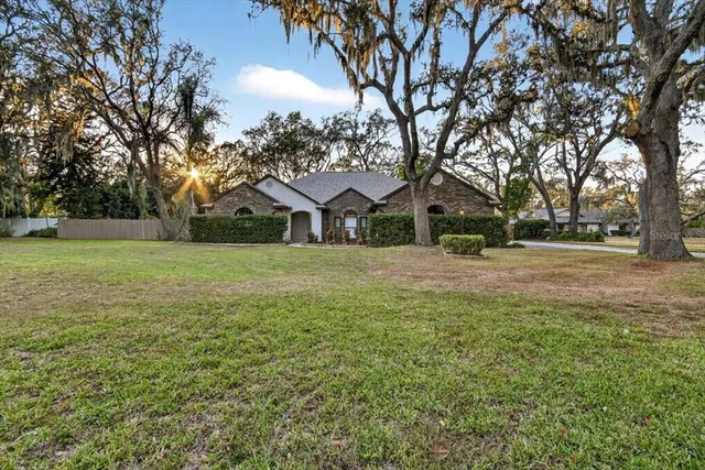 a very nice looking room with a big bed and a chandelier