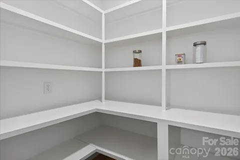 a view of an empty walk in closet