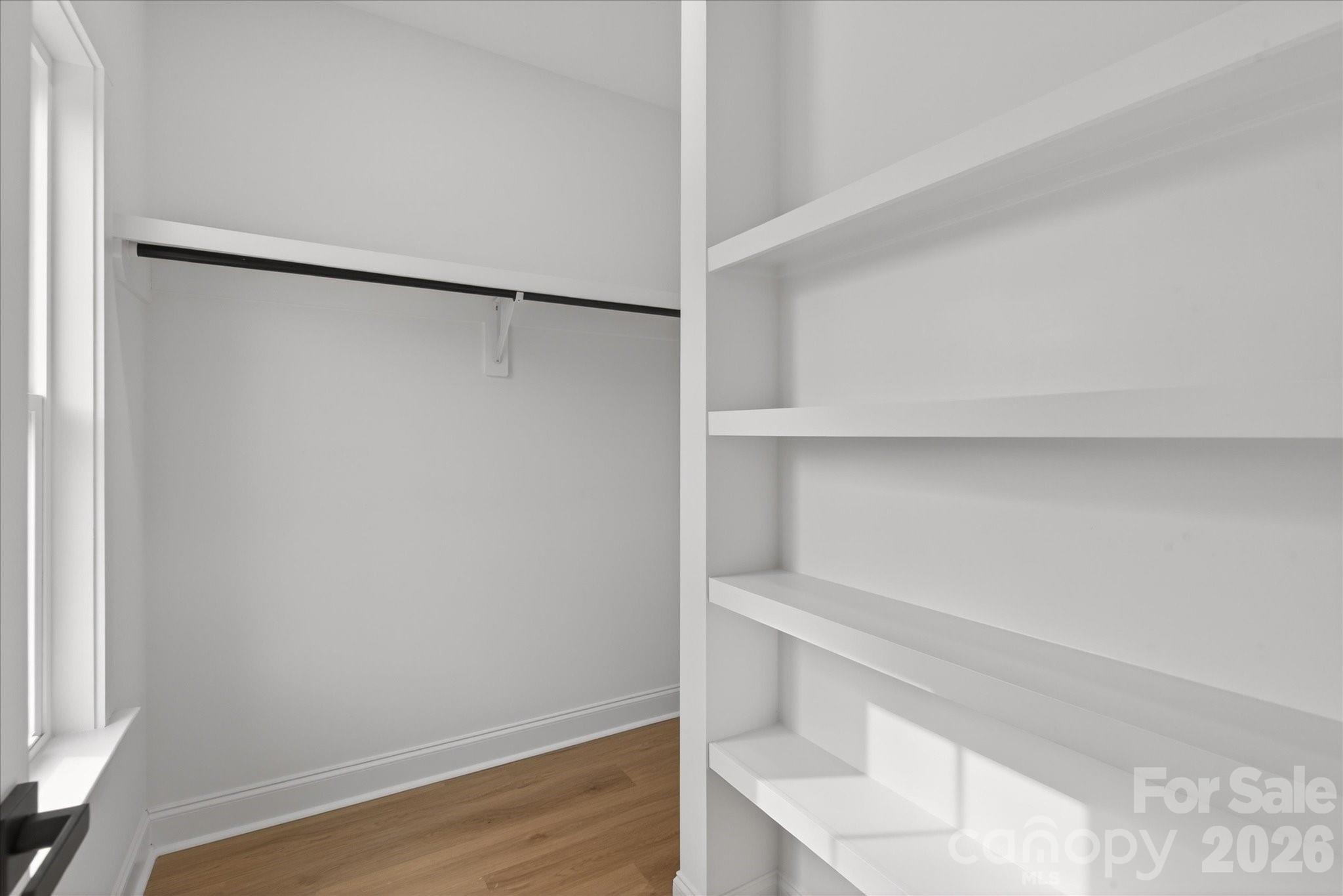 216 Lander Street Charlotte, NC 28208 - Photo 20 of 33 a view of an empty walk in closet