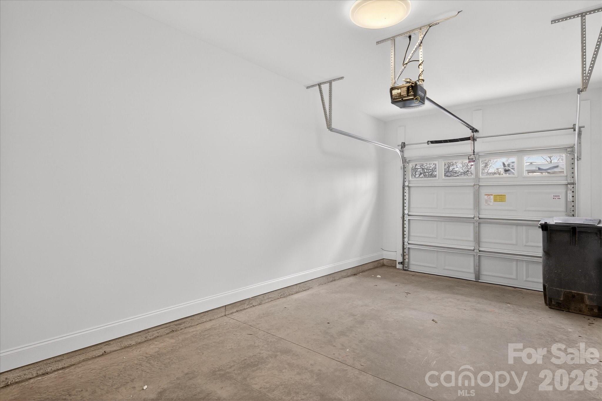 216 Lander Street Charlotte, NC 28208 - Photo 30 of 33 a view of a room with racks on the wall