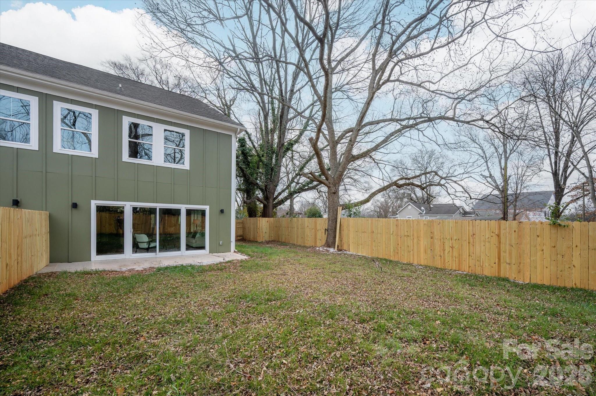 216 Lander Street Charlotte, NC 28208 - Photo 32 of 33 a view of a house with a yard