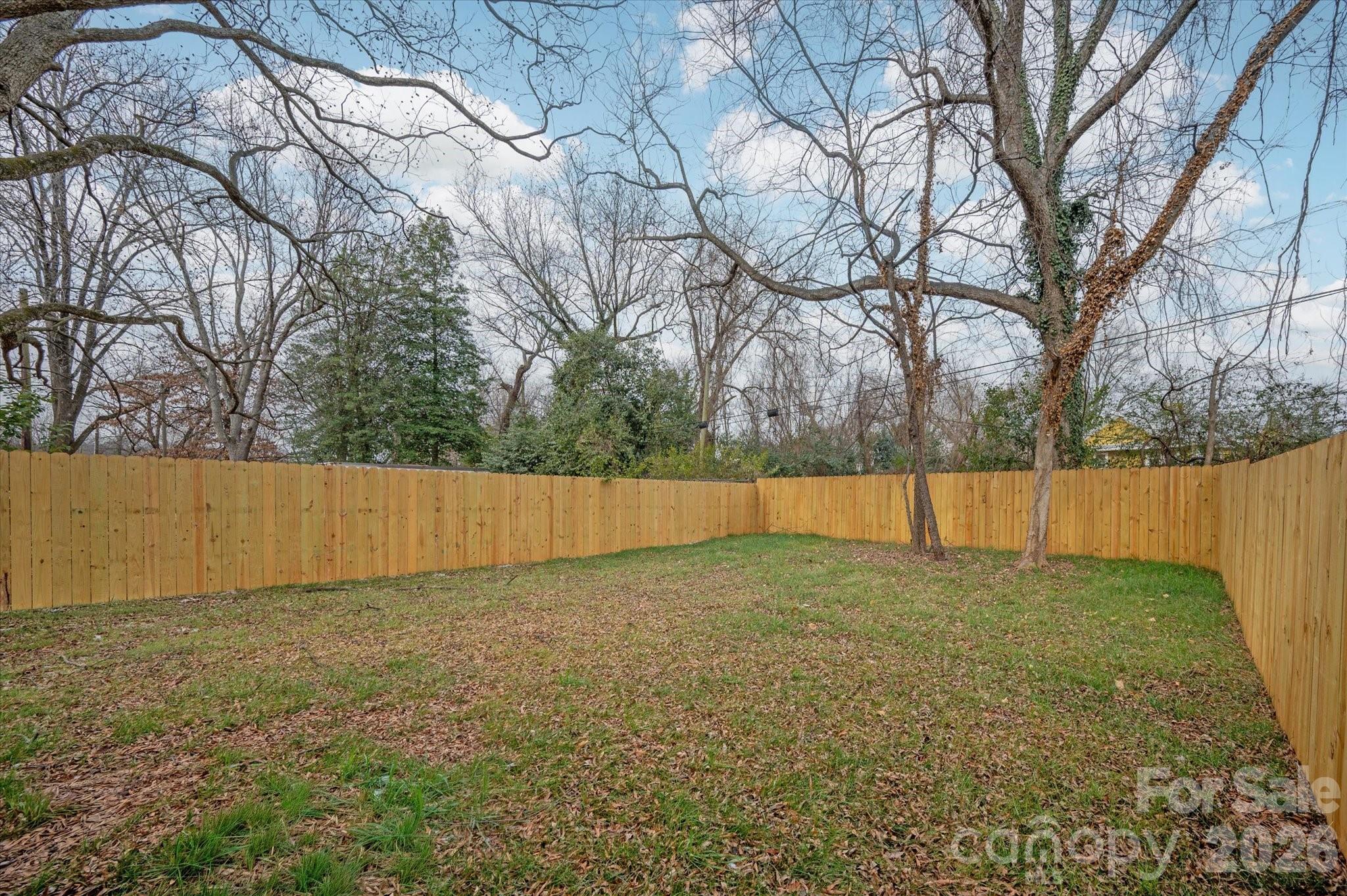 216 Lander Street Charlotte, NC 28208 - Photo 33 of 33 a view of backyard with wooden fence
