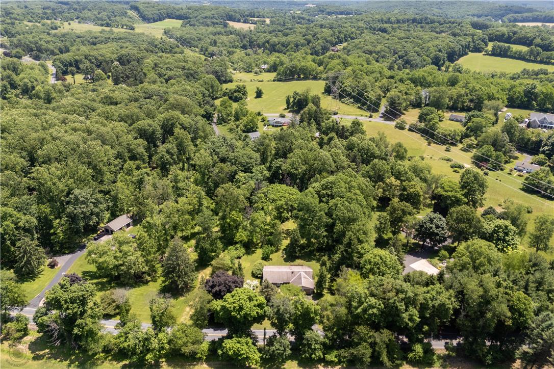 5311 Macungie Mountain Road Macungie, PA 18062 - Photo 52 of 56 An aerial perspective reveals a secluded property nestled amidst a dense, verdant landscape.