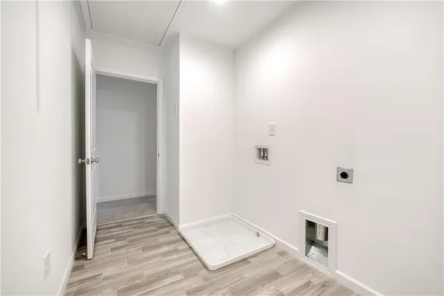 a view of a livingroom with wooden floor