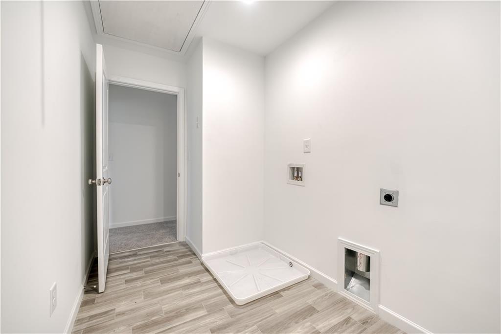 1377 R Liberty Park Drive Braselton, GA 30517 - Photo 16 of 38 a view of a livingroom with wooden floor