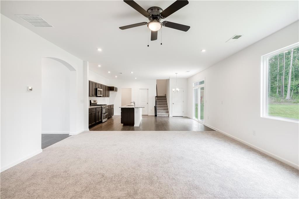 1377 R Liberty Park Drive Braselton, GA 30517 - Photo 9 of 38 a view of a kitchen with refrigerator and windows