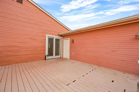a view of a backyard of the house