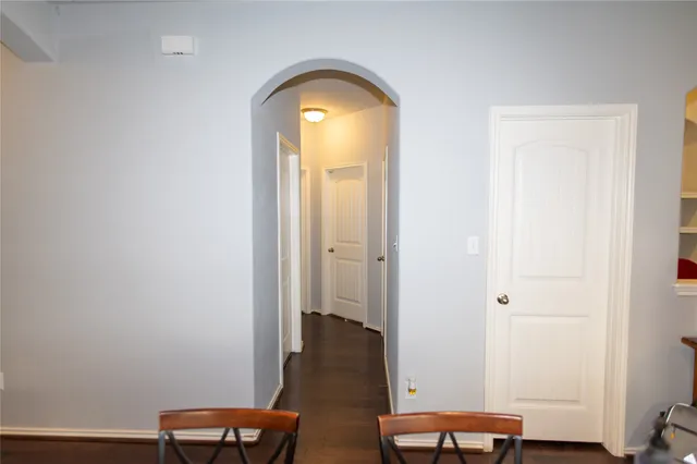 a living room with a bed and furniture