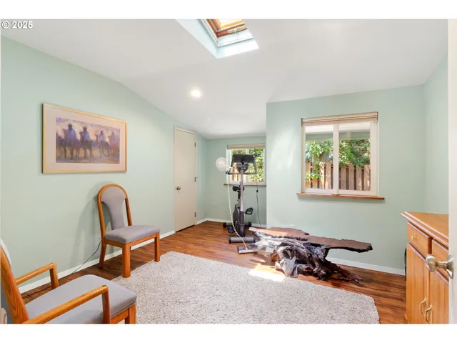 a room with furniture and a window