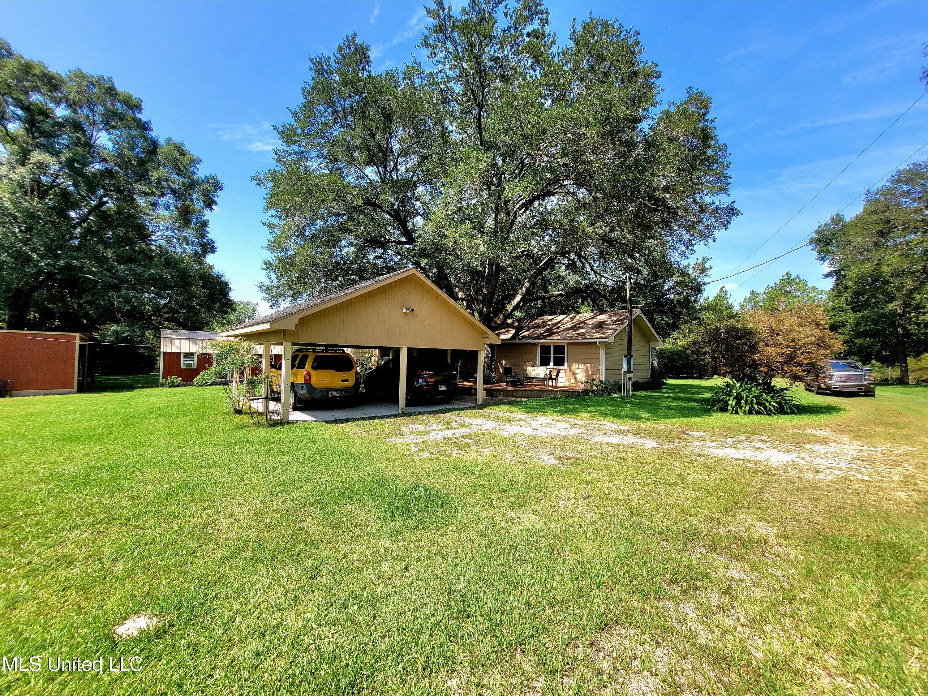 24440 Ramsey Road Saucier, MS 39574 - Photo 16 of 21 carport