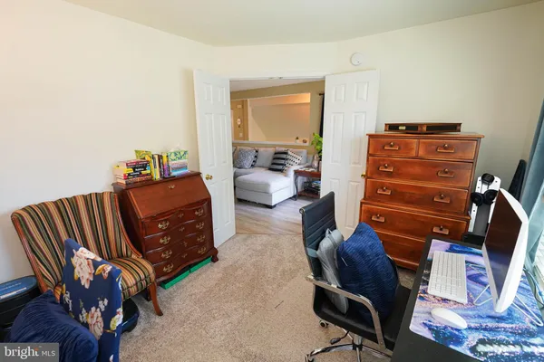 a room with furniture closet and a couch