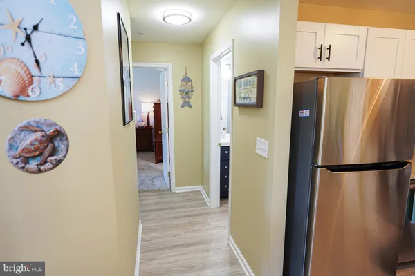 a view of a refrigerator and a microwave