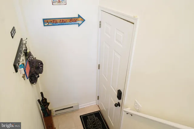 a view of a hallway with front door