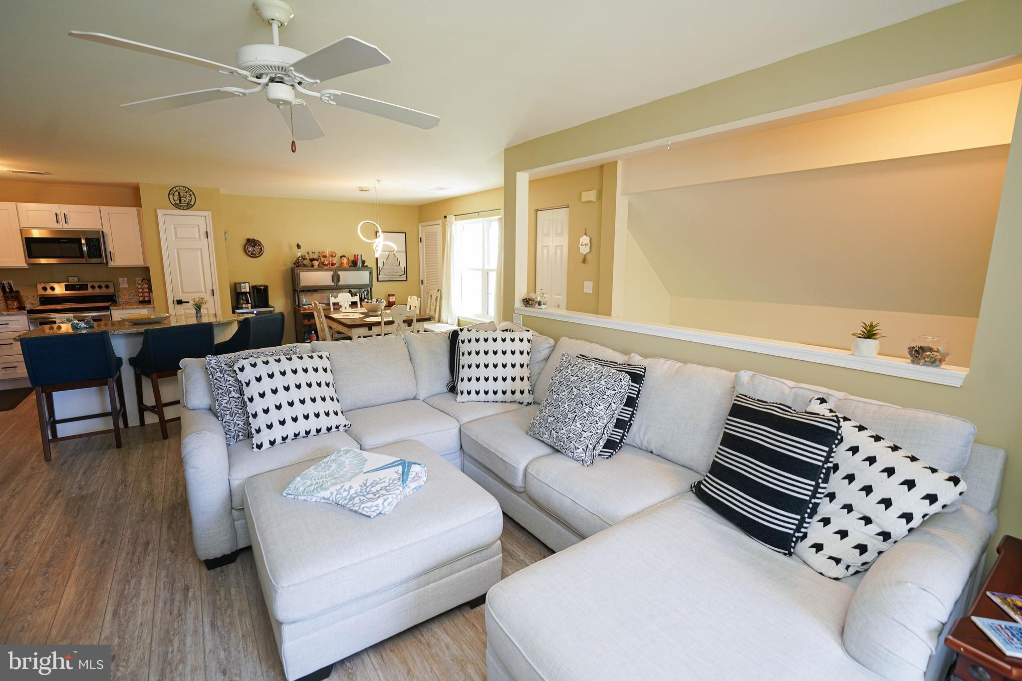 11421 Manklin Creek Road, Unit 4 Berlin, MD 21811 - Photo 8 of 47 Open living area off kitchen/dining area/entry