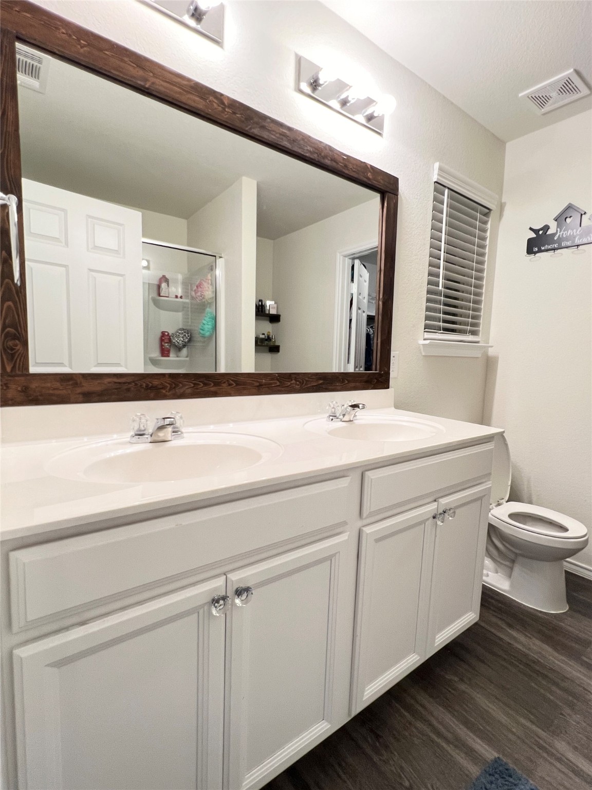 14734 Jasper Stream Court Houston, TX 77069 - Photo 19 of 22 a bathroom with a sink and a mirror