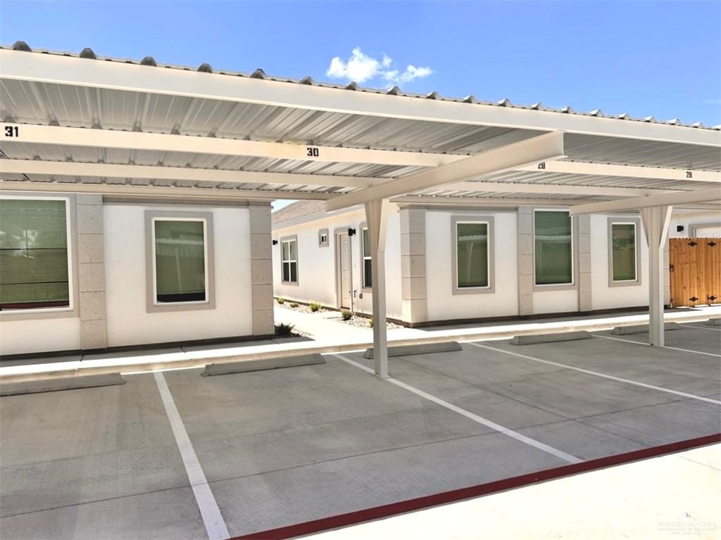 740 North Alamo Road, Unit 20 Alamo, TX 78516 - Photo 2 of 11 a view of a building with entryway