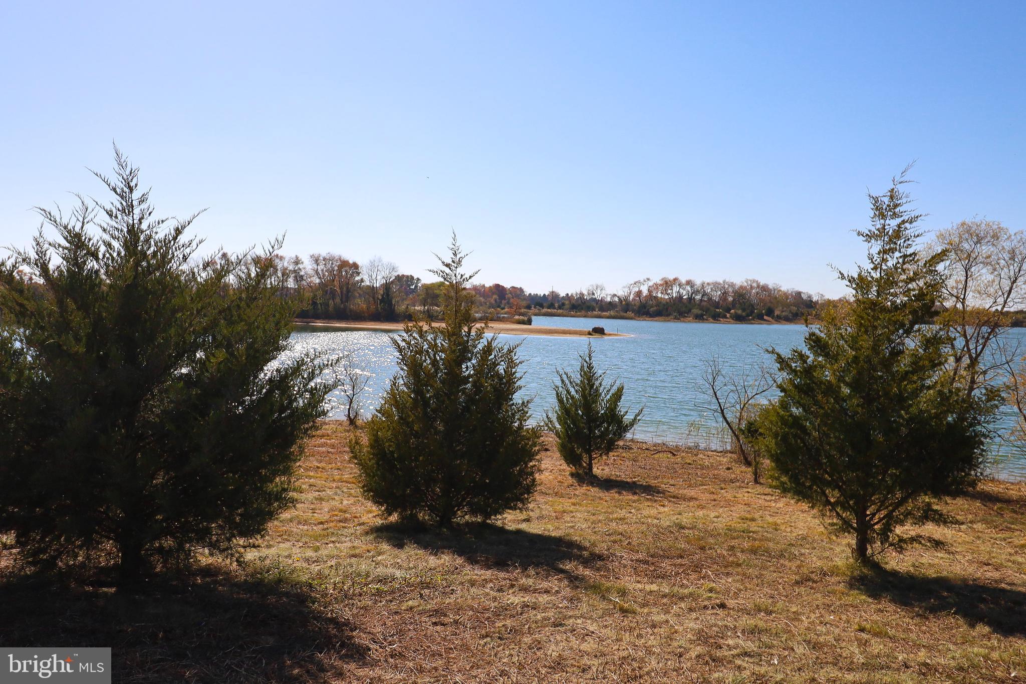 L26 Dubois Road Salem, NJ 08079 - Photo 26 of 49 a view of a lake with beach in background