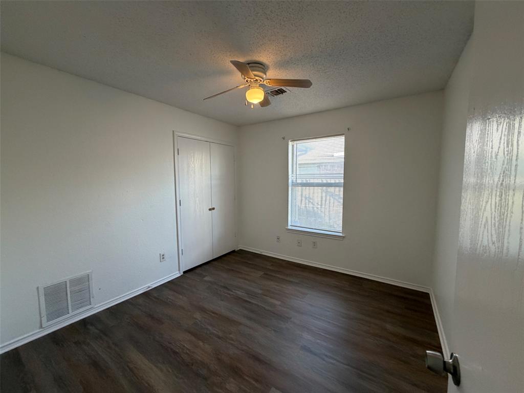 7116 Nohl Ranch Road Fort Worth, TX 76133 - Photo 7 of 10 Guest Bedroom 1