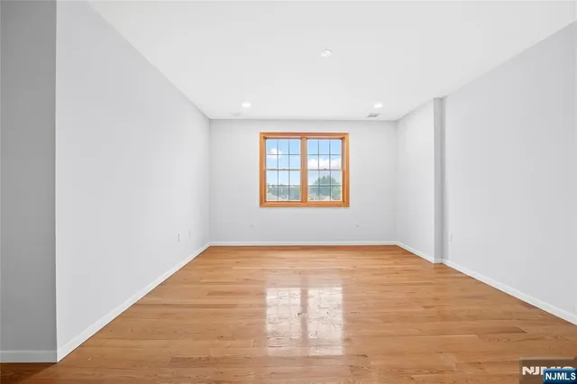 a view of an empty room with window