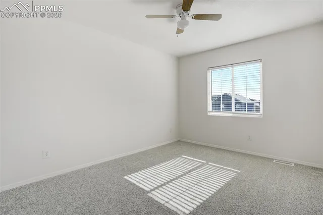 a view of a room with a window