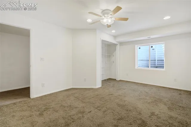 a bathroom with a sink a mirror and shower