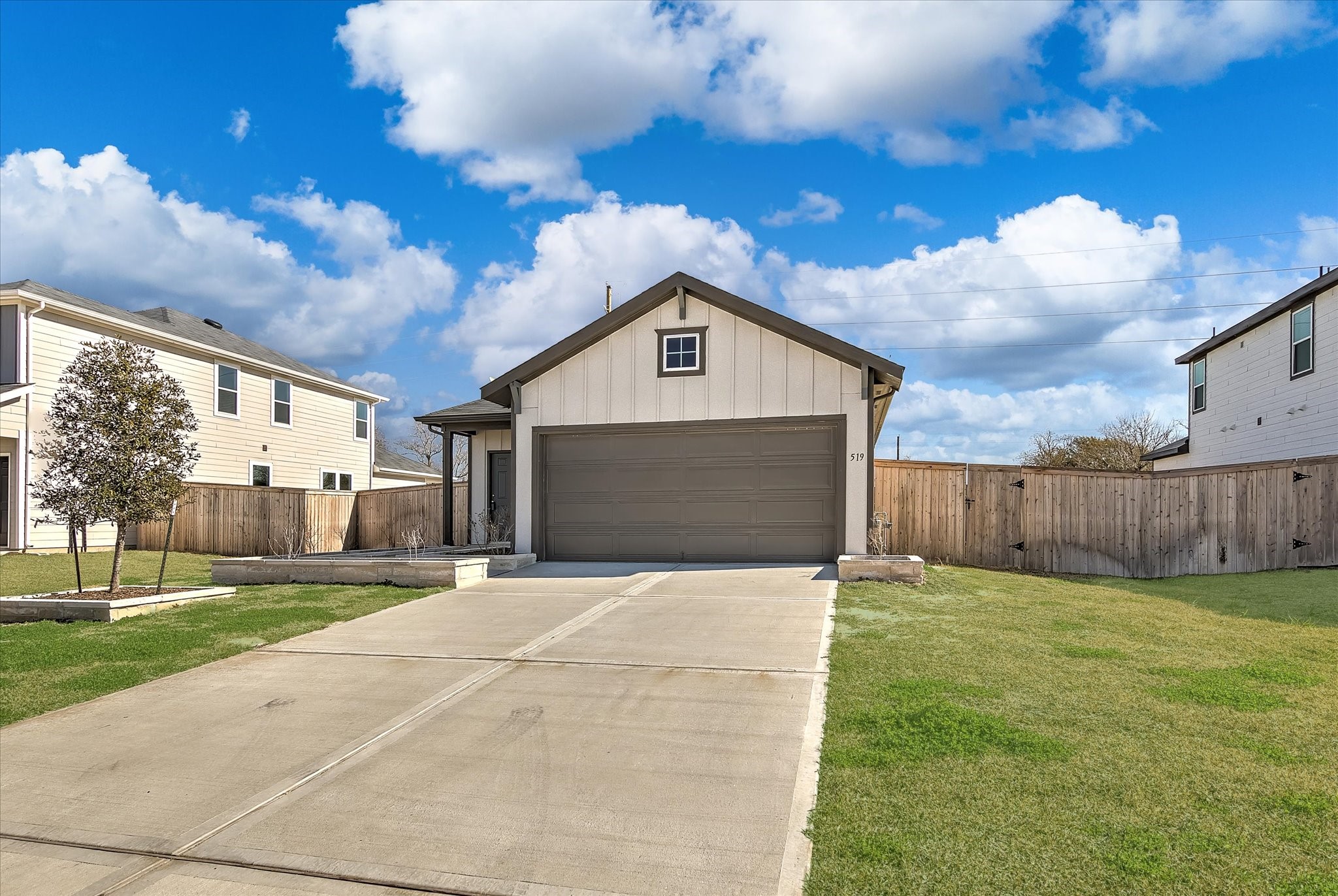 519 Louis Lane Baytown, TX 77523 - Photo 2 of 43 a front view of a house with a yard