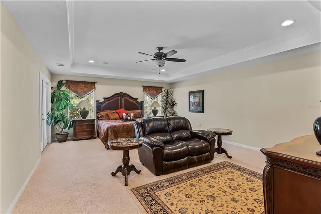 a bedroom with furniture and a window