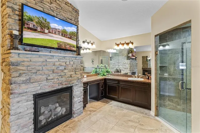 a dining room with furniture and potted plants
