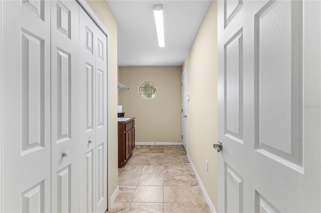 10710 Southwest 49th Avenue Ocala, FL 34476 - Photo 37 of 48 a view of a hallway with a hallway