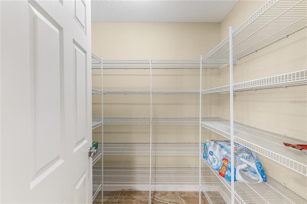 10710 Southwest 49th Avenue Ocala, FL 34476 - Photo 38 of 48 a bathroom with a window and a shower
