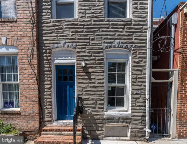 a front view of a house with a window