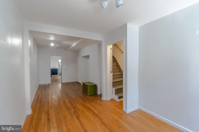 a view of entryway with wooden floor
