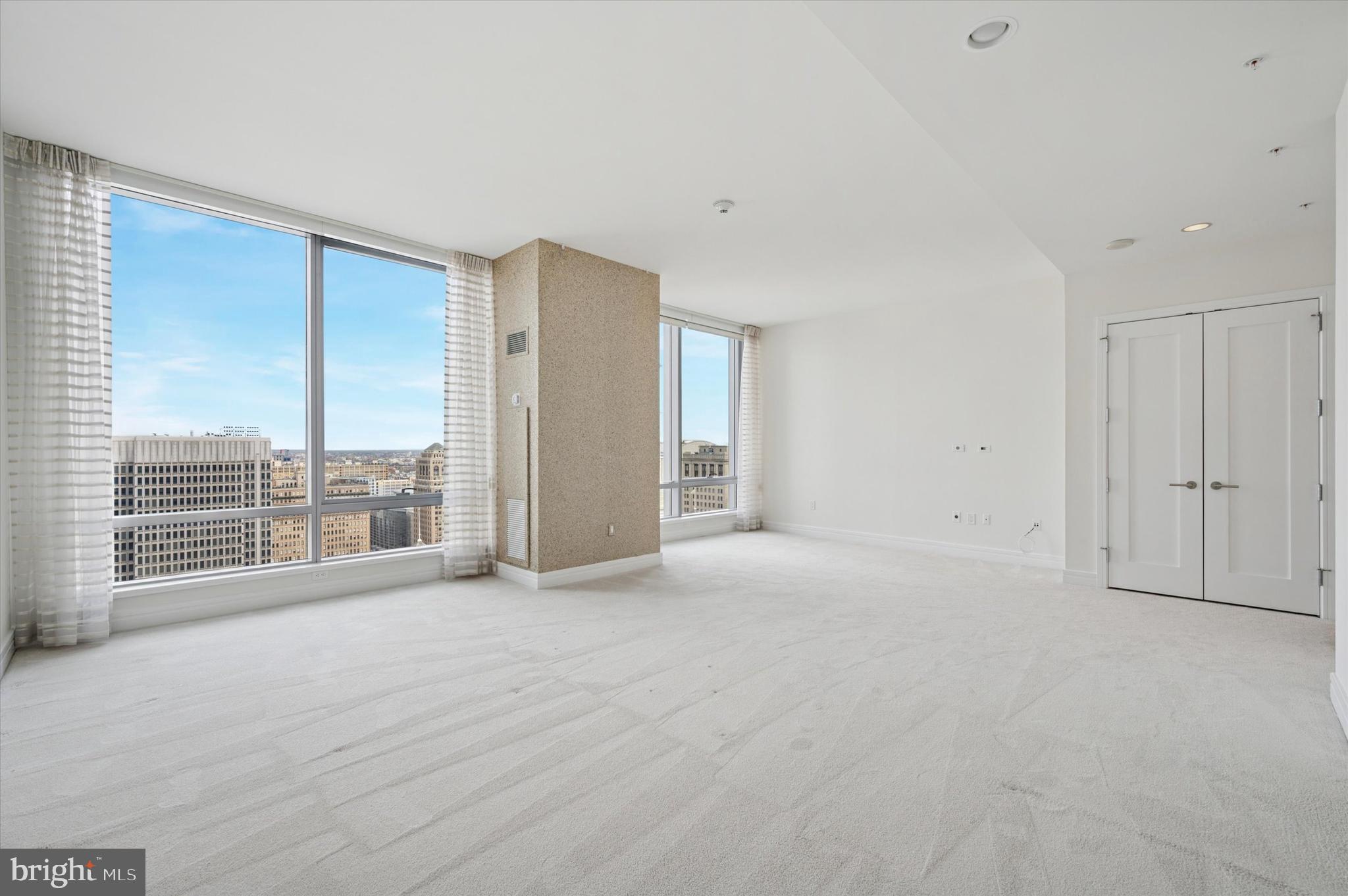 1414 South Penn Square, Unit 26CDE Philadelphia, PA 19102 - Photo 17 of 53 a view of an empty room with a balcony