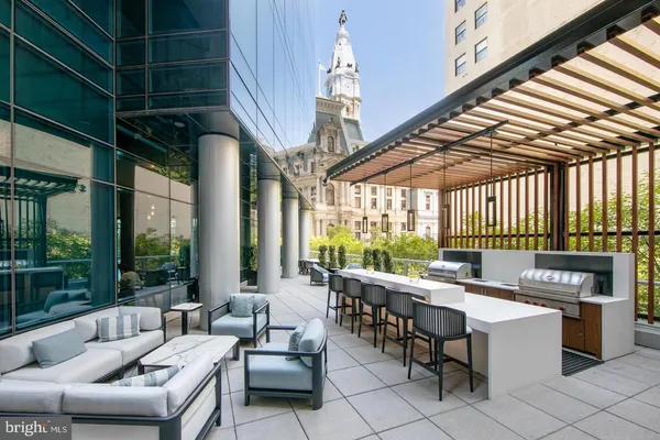 a outdoor space with lots of tables and chairs
