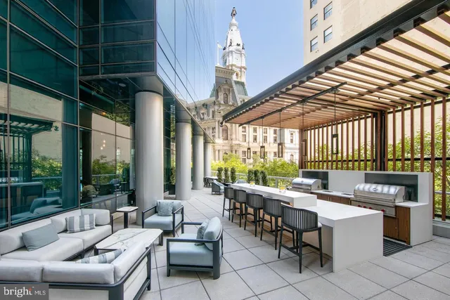 a outdoor space with lots of tables and chairs