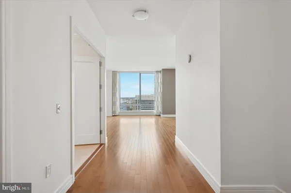 a view of an empty room and window