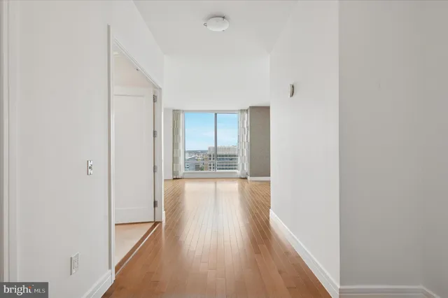 a view of an empty room and window