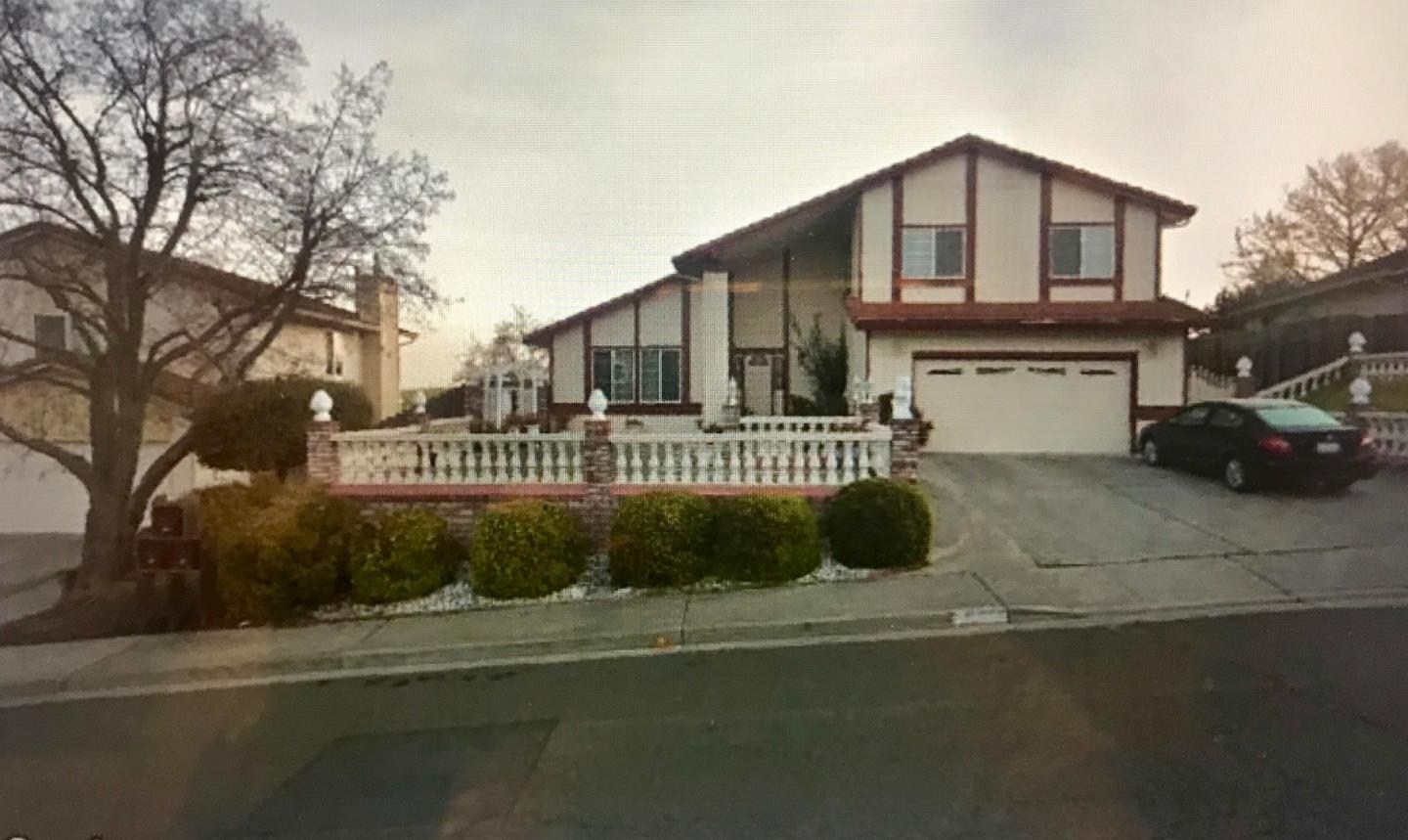 313 Violet Road Hercules, CA 94547 - Photo 1 of 6 a front view of a house with a yard and garage