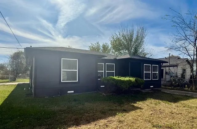 a house view with a garden space