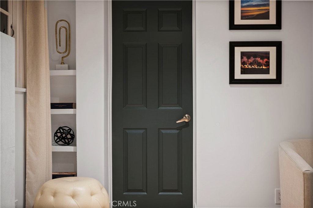 11305 Valley Spring Lane Studio City, CA 91602 - Photo 14 of 50 a view of a hallway with bathroom