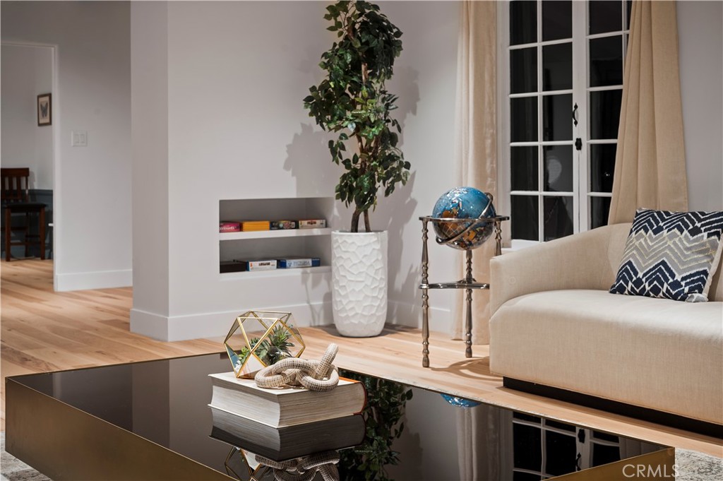 11305 Valley Spring Lane Studio City, CA 91602 - Photo 19 of 50 a living room with furniture and a potted plant