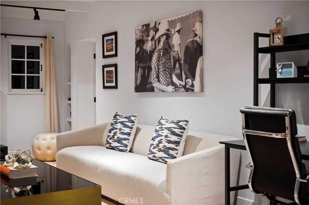 11305 Valley Spring Lane Studio City, CA 91602 - Photo 21 of 50 a living room with a couch