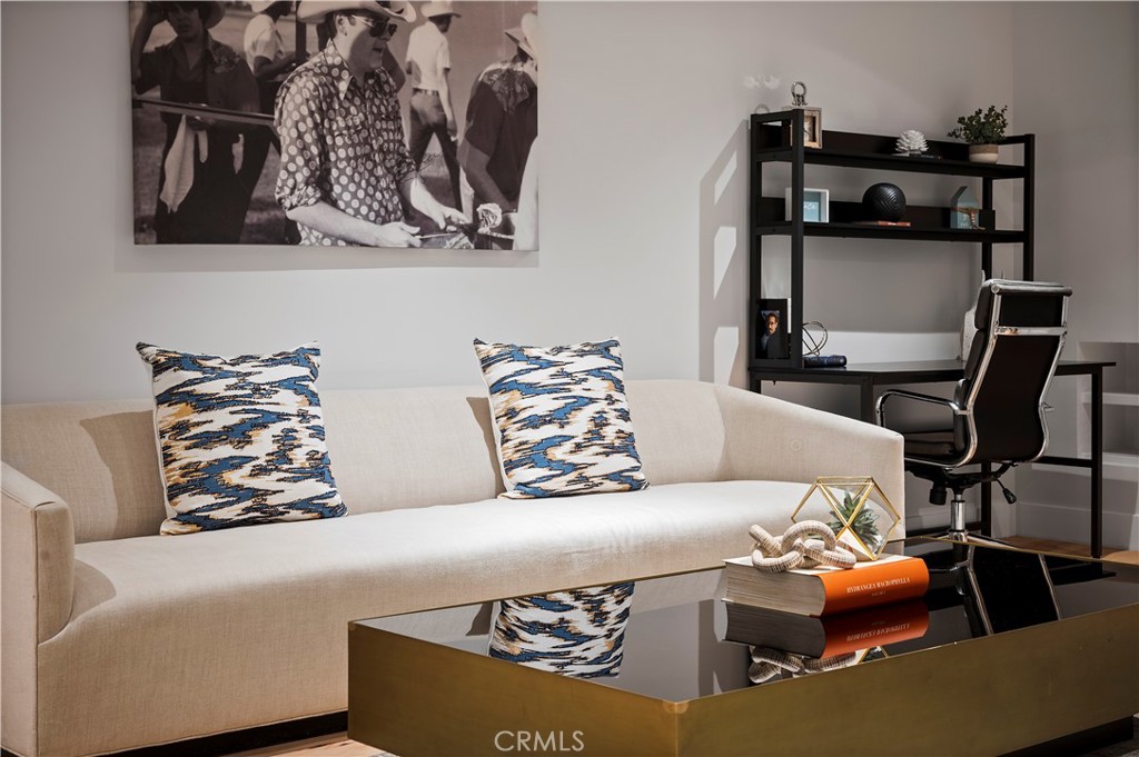 11305 Valley Spring Lane Studio City, CA 91602 - Photo 22 of 50 a living room with a couch and dresser