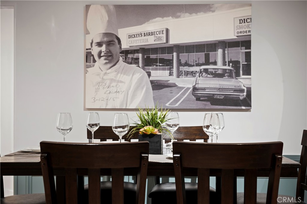 11305 Valley Spring Lane Studio City, CA 91602 - Photo 23 of 50 a dining room with furniture and wooden floor