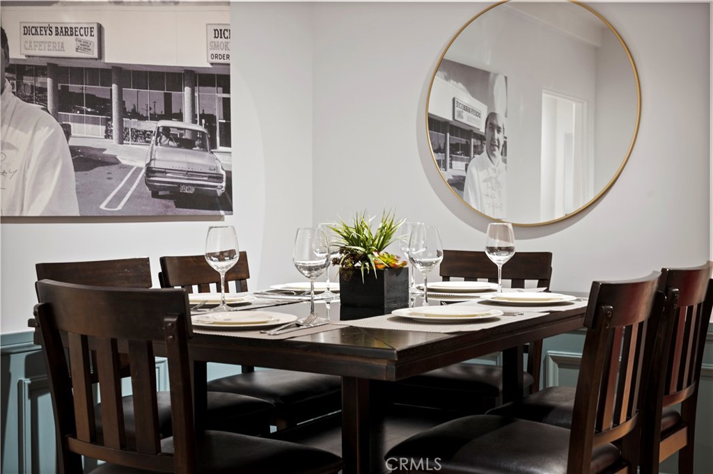 11305 Valley Spring Lane Studio City, CA 91602 - Photo 27 of 50 a view of a dining room with furniture