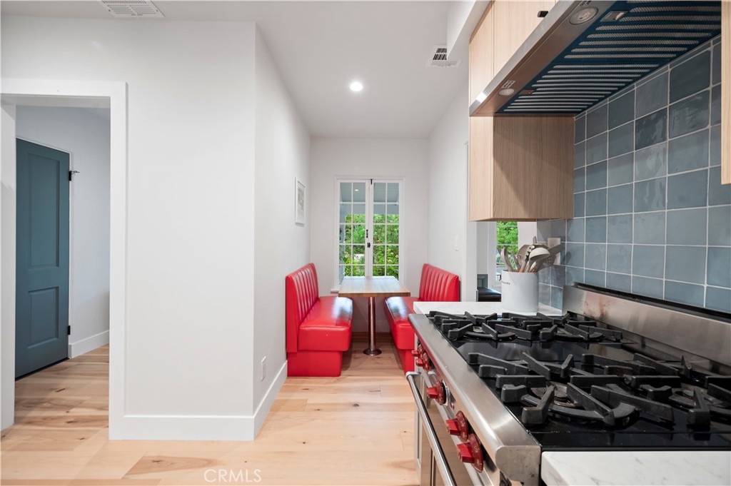 11305 Valley Spring Lane Studio City, CA 91602 - Photo 30 of 50 a kitchen with a stove and a window