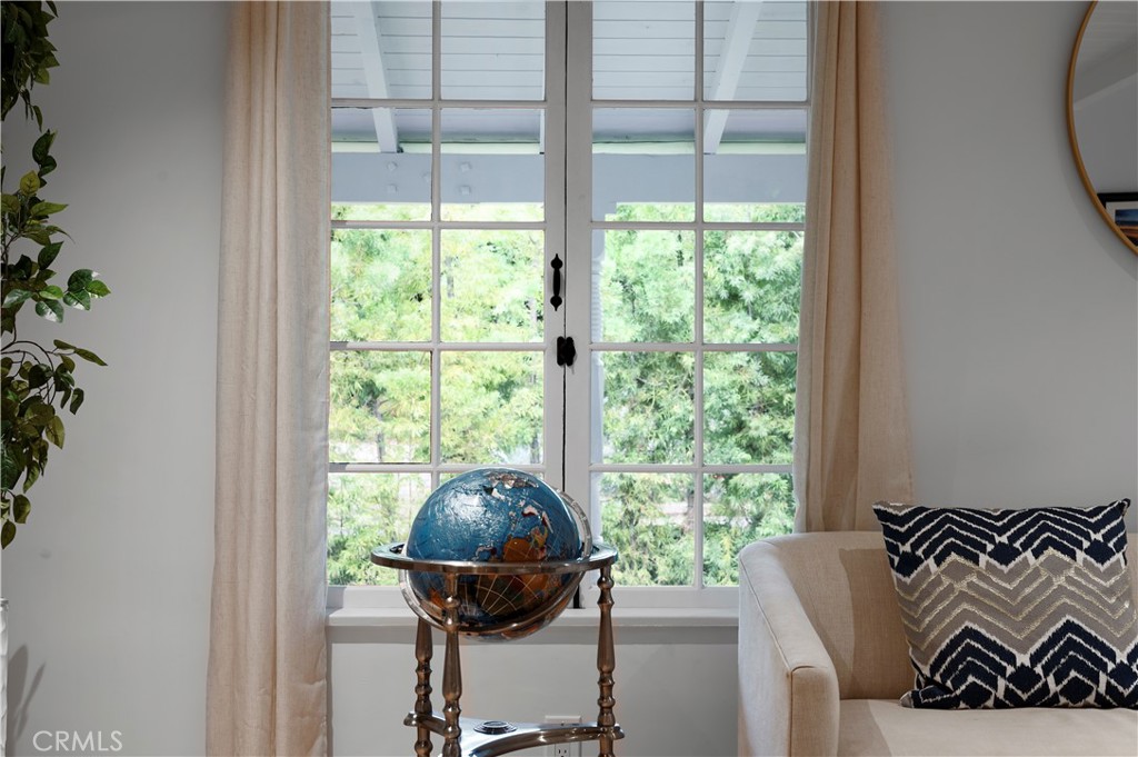 11305 Valley Spring Lane Studio City, CA 91602 - Photo 3 of 50 a living room with furniture and a floor to ceiling window