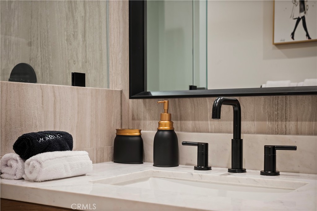 11305 Valley Spring Lane Studio City, CA 91602 - Photo 46 of 50 a kitchen with a stove and a white cabinet