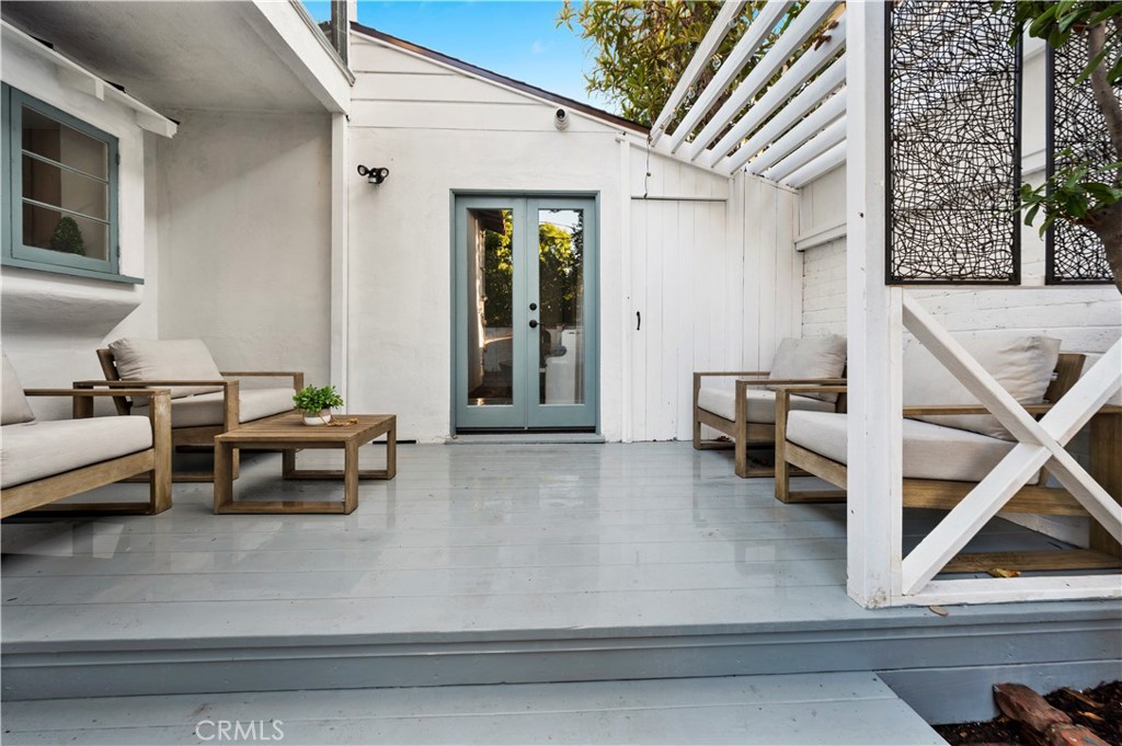 11305 Valley Spring Lane Studio City, CA 91602 - Photo 50 of 50 a living room with furniture and a table