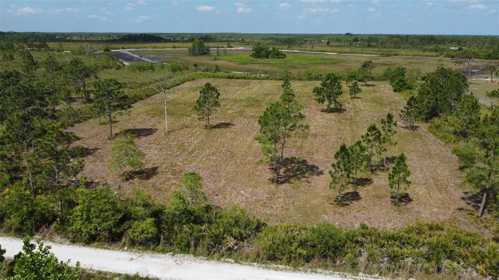 Muse Rd Street St. Cloud, FL 34773 - Photo 1 of 1 a view of a lake with houses in outdoor space